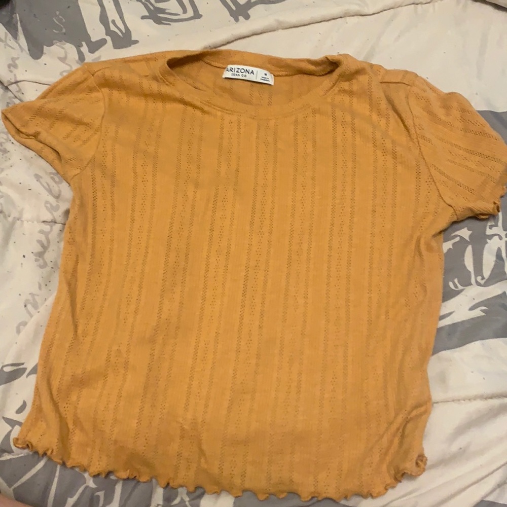 orangish shirt. arizona medium